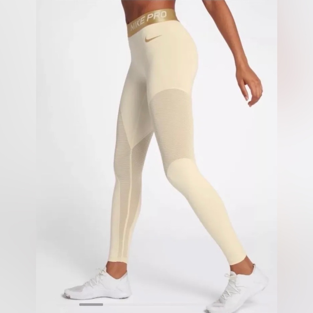Nike pro , Leggings _ tights _  Gold Cream  size small